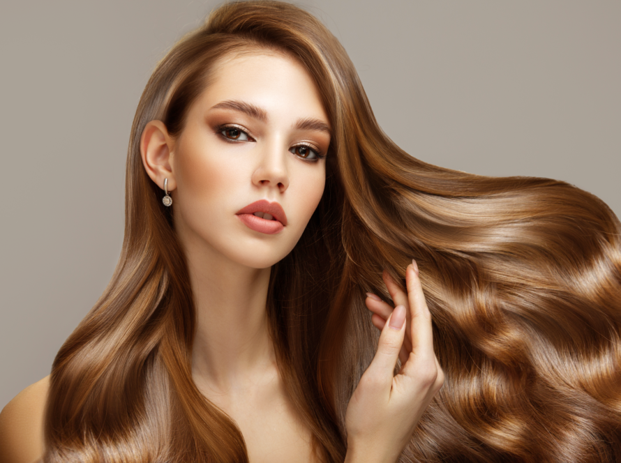 A woman headshot with beautiful silky hair