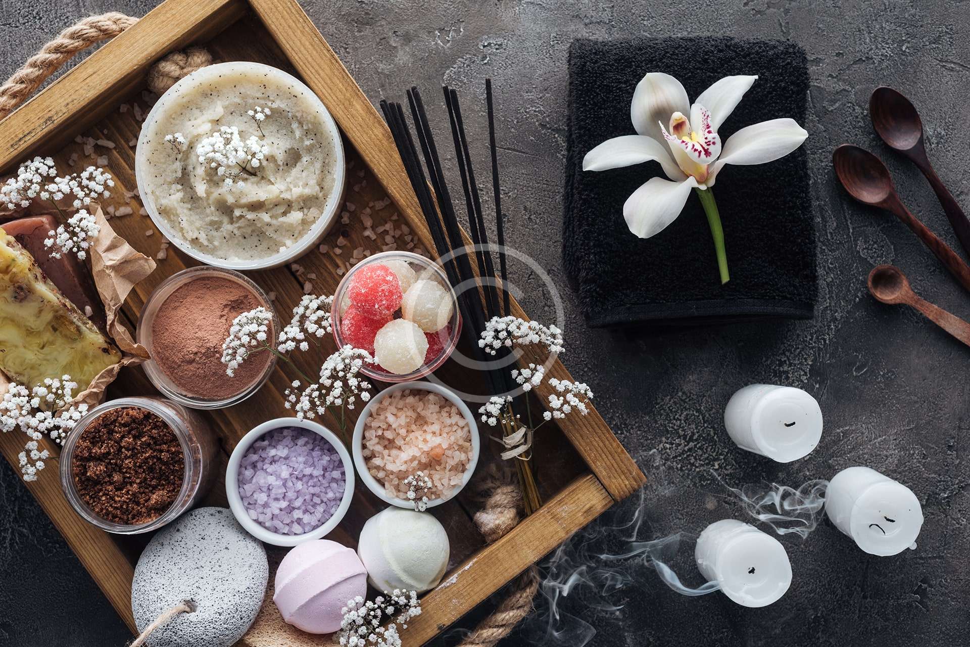 An image of herbs and medicines for the massage