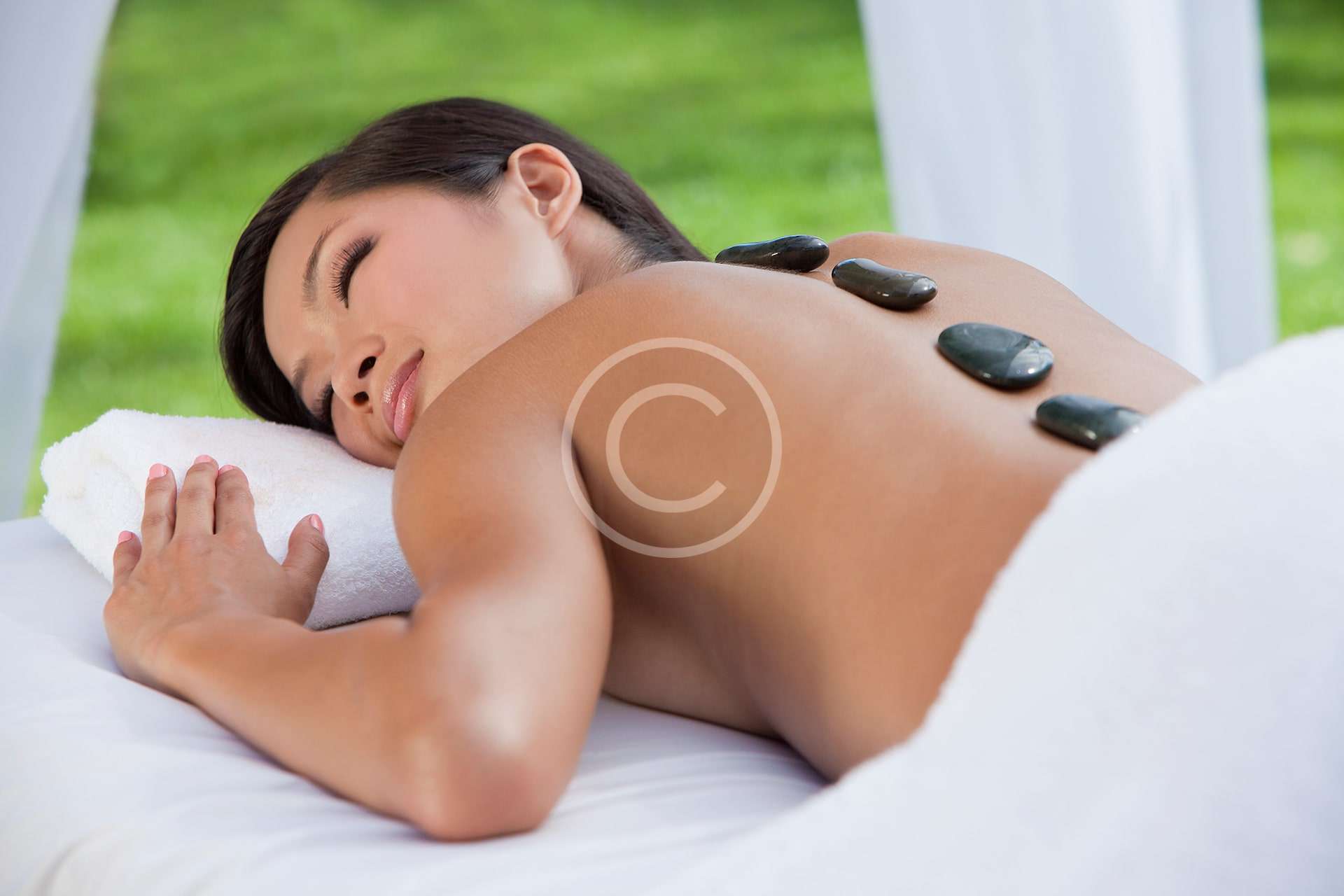 A woman getting ready for a massage